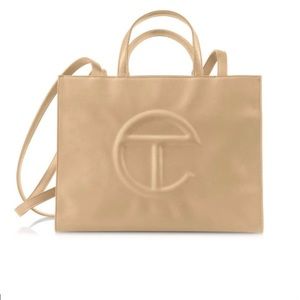 COPY - TELFAR Medium Cream Shopping Bag
Vegan Leather Unisex Tote…super hard to…